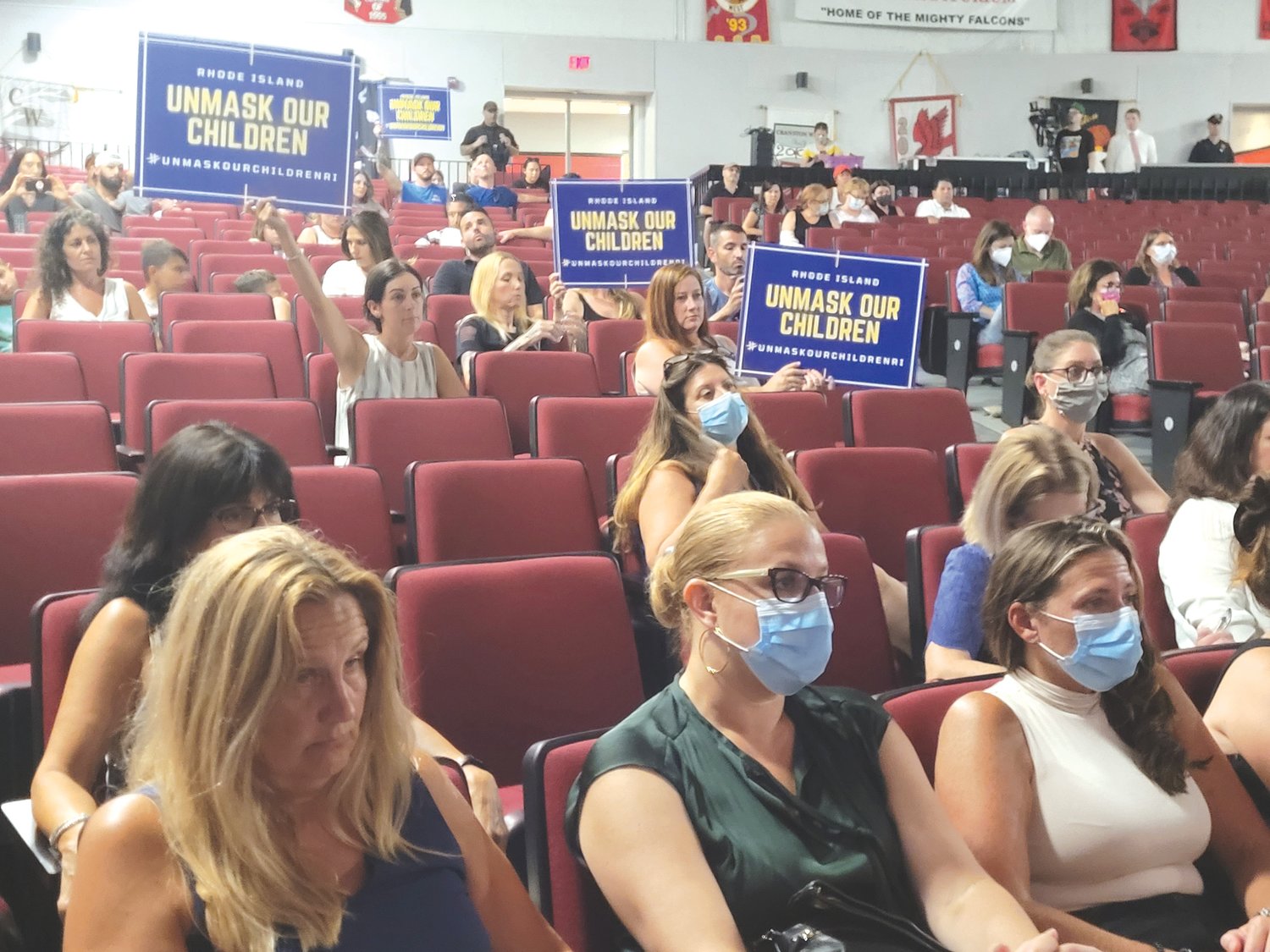 TWO SIDES: Parents packed the Cranston High School West auditorium for a public hearing on a mask mandate for the city’s school system.
